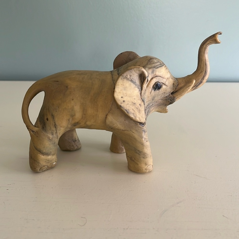 Small decorative elephant sculpture.